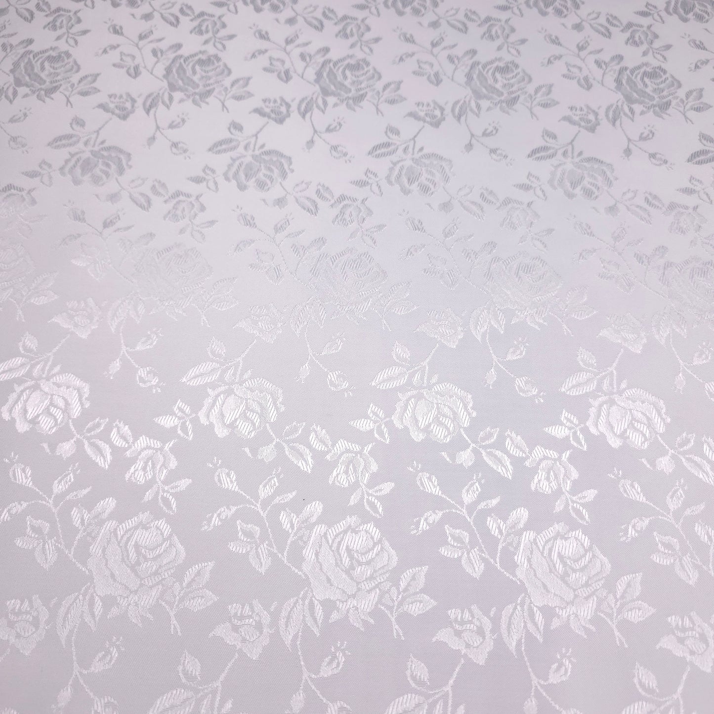 White floral pattern on a true white background