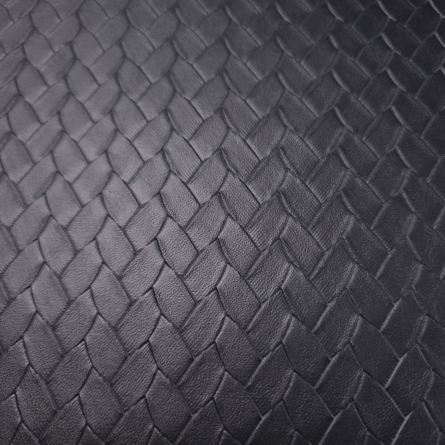 EMBOSSED WOVEN BLACK VINYL