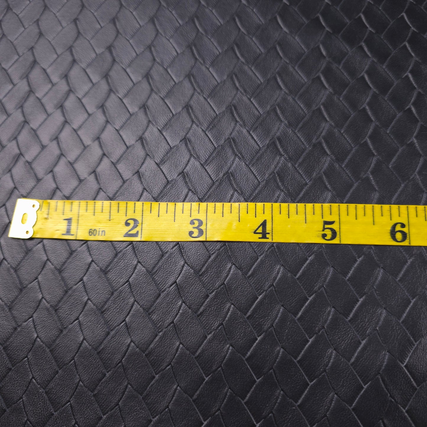 EMBOSSED WOVEN BLACK VINYL