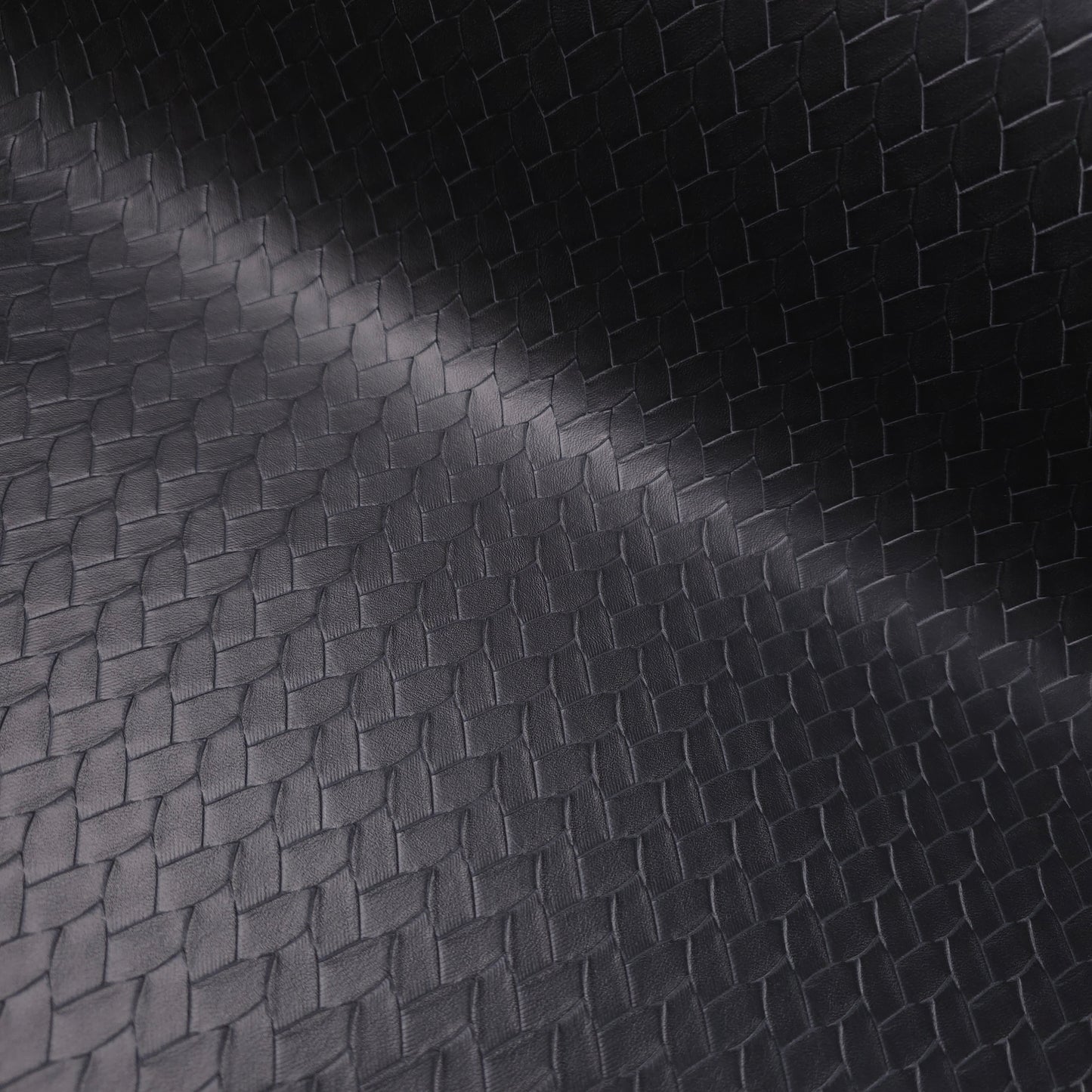 EMBOSSED WOVEN BLACK VINYL