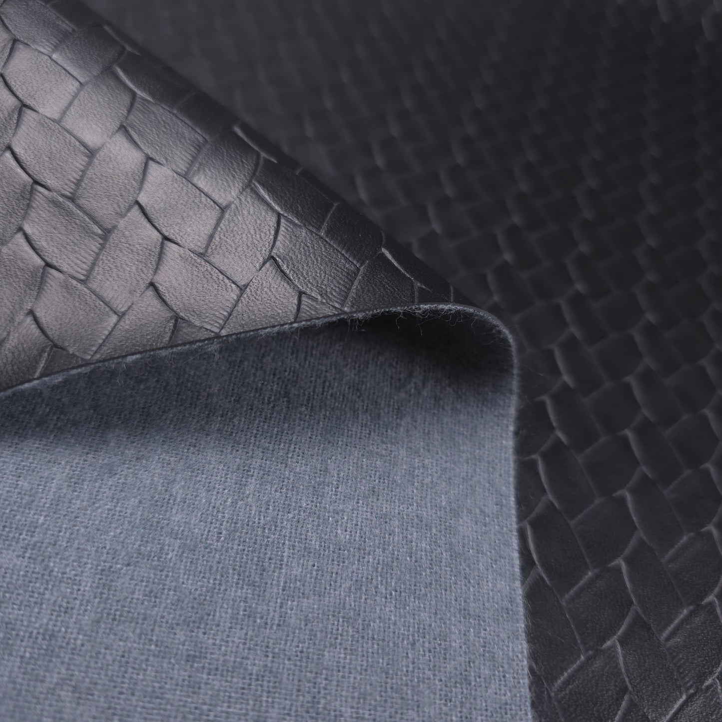 EMBOSSED WOVEN BLACK VINYL