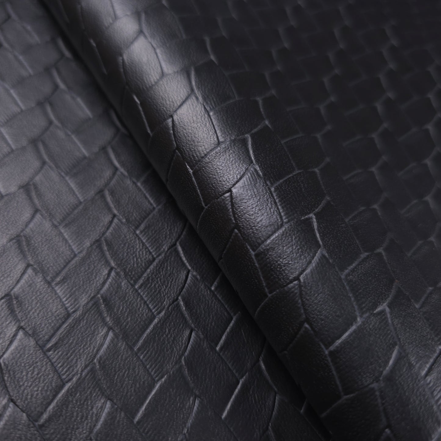 EMBOSSED WOVEN BLACK VINYL