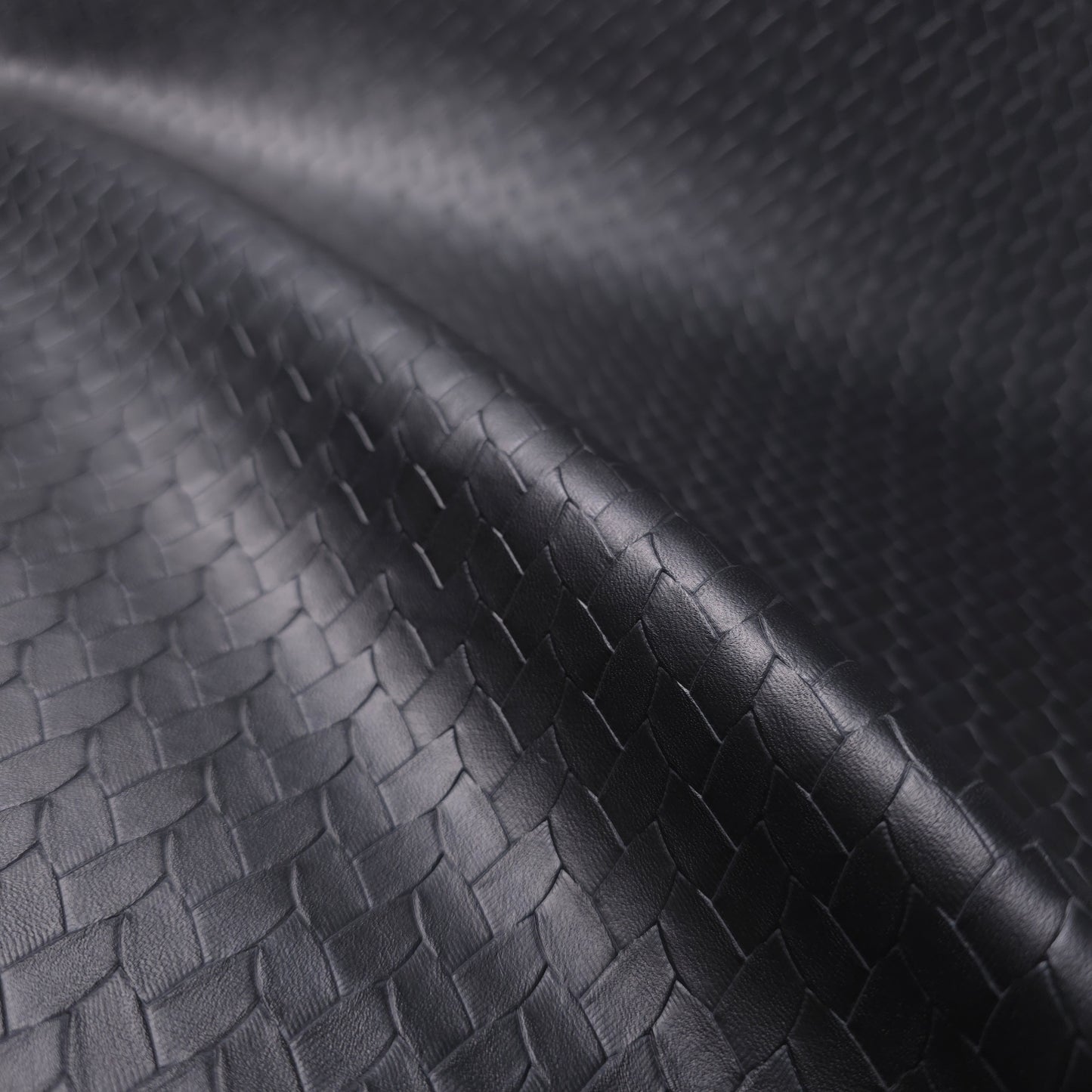 EMBOSSED WOVEN BLACK VINYL