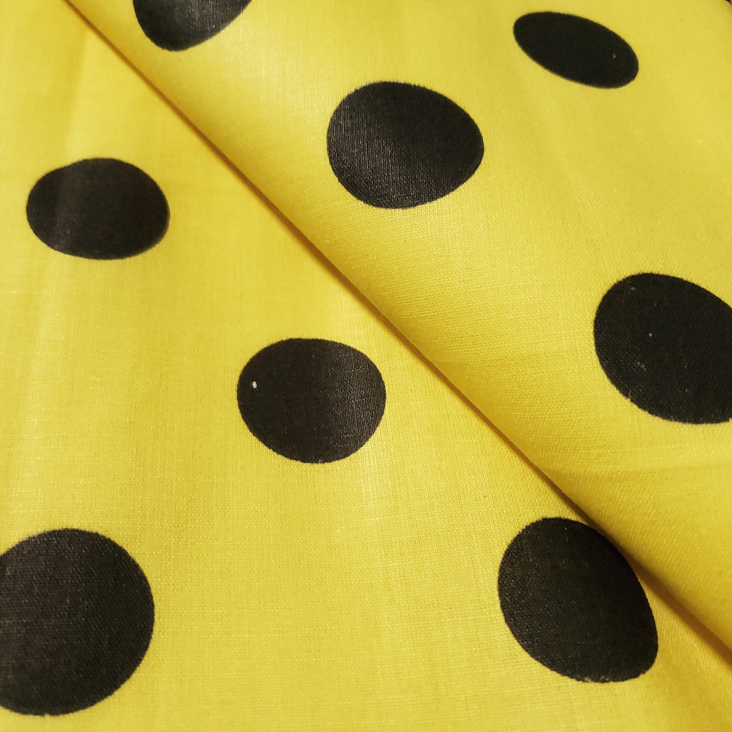 ONE INCH POLKA DOT BLACK ON YELLOW