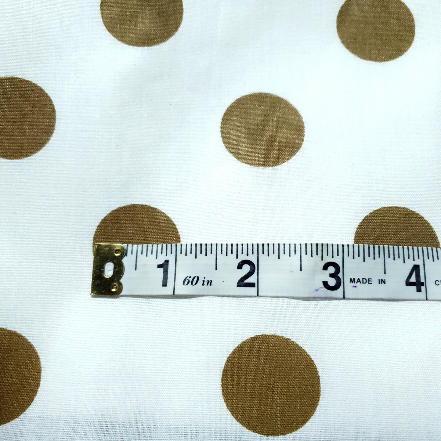 ONE INCH POLKA DOT BRONZE GOLD ON WHITE