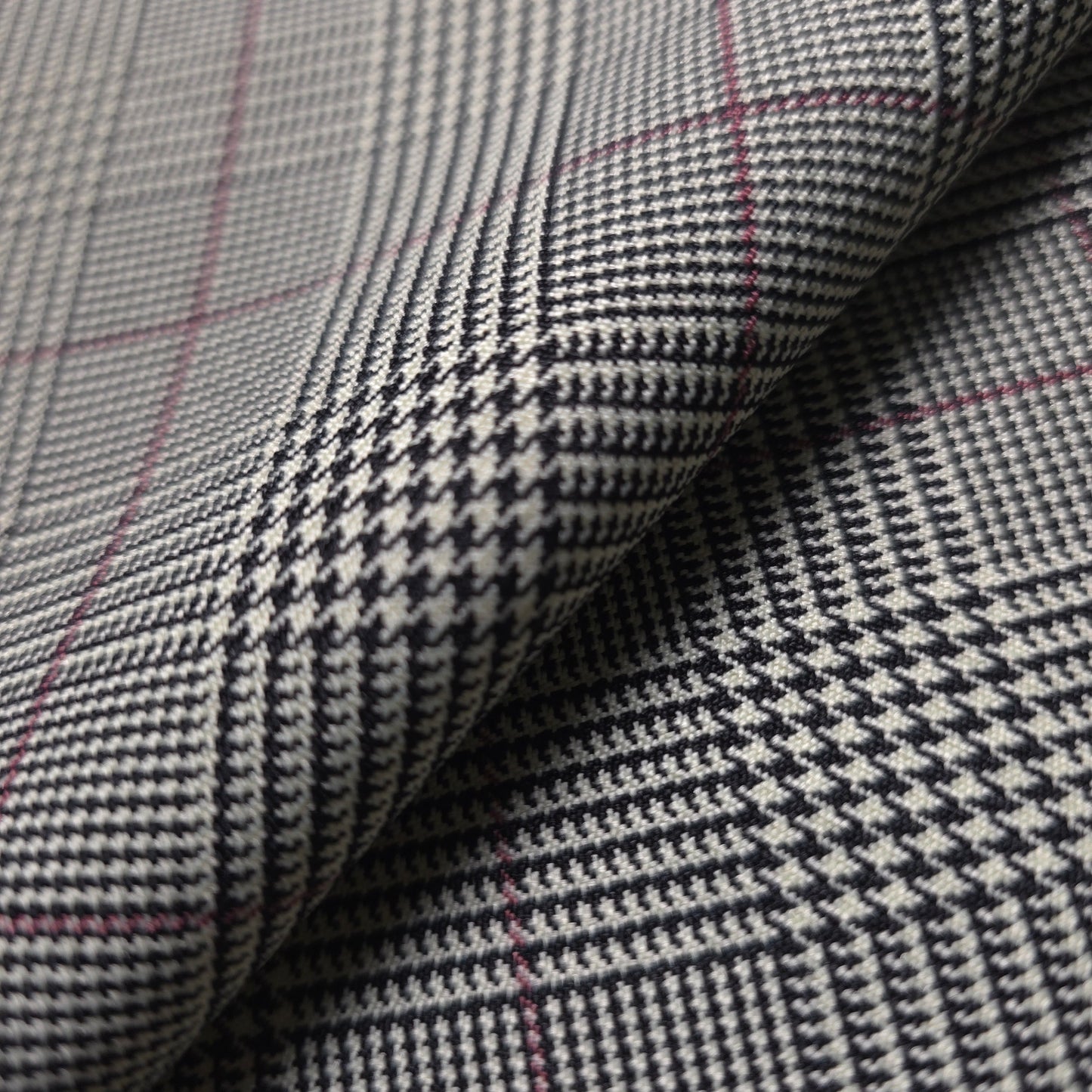 BLACK AND RED POLYESTER HOUNDSTOOTH REVERSIBLE PLAID SHIRTING FABRIC