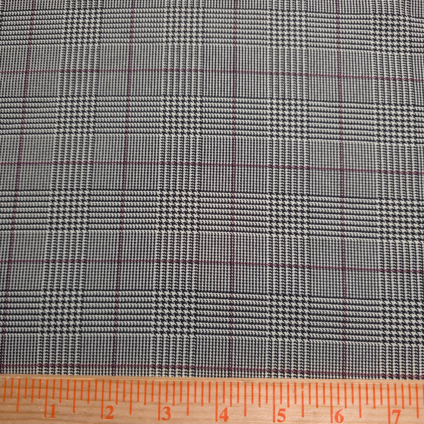 BLACK AND RED POLYESTER HOUNDSTOOTH REVERSIBLE PLAID SHIRTING FABRIC