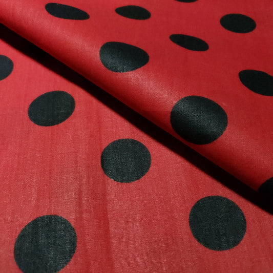 ONE INCH POLKA DOT BLACK ON RED