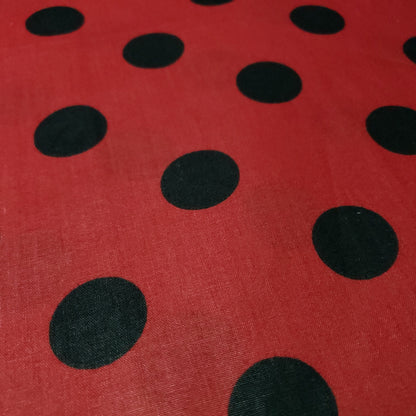 ONE INCH POLKA DOT BLACK ON RED