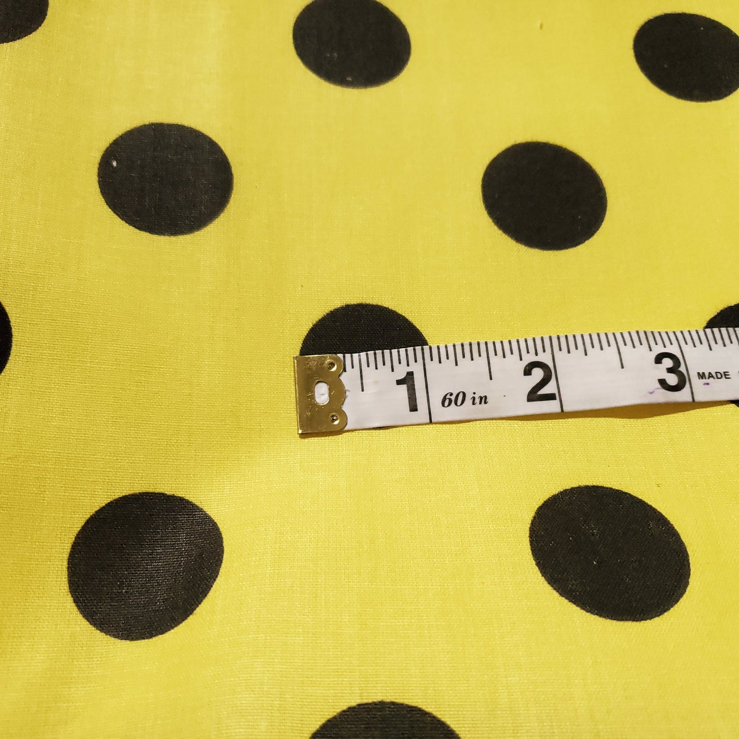 ONE INCH POLKA DOT BLACK ON YELLOW