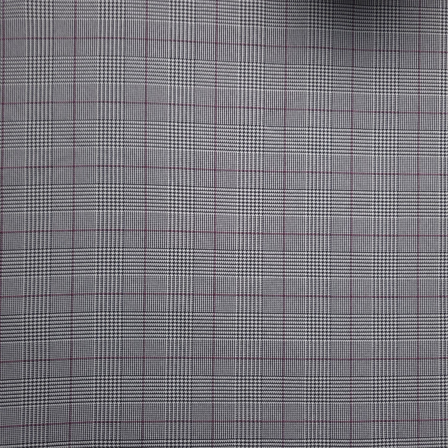 BLACK AND RED POLYESTER HOUNDSTOOTH REVERSIBLE PLAID SHIRTING FABRIC