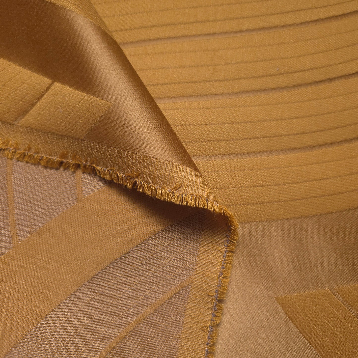 ART DECO WAVE GOLD EMBOSSED UPHOLSTERY FABRIC