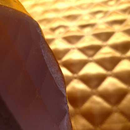 GOLD TAFFETA HEAT FUSED DIAMOND QUILTED BATTING FABRIC
