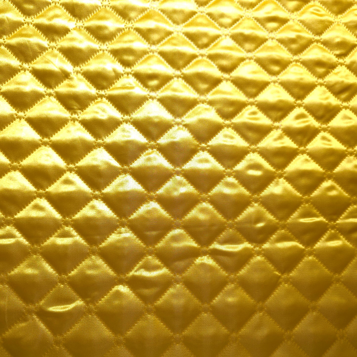 CANARY YELLOW TAFFETA HEAT FUSED DIAMOND QUILTED BATTING FABRIC