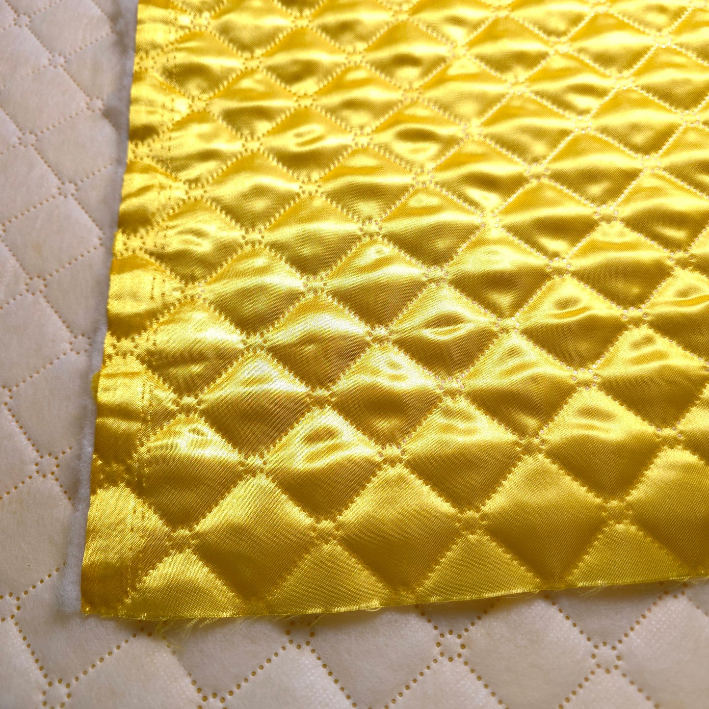 CANARY YELLOW TAFFETA HEAT FUSED DIAMOND QUILTED BATTING FABRIC