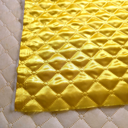 CANARY YELLOW TAFFETA HEAT FUSED DIAMOND QUILTED BATTING FABRIC