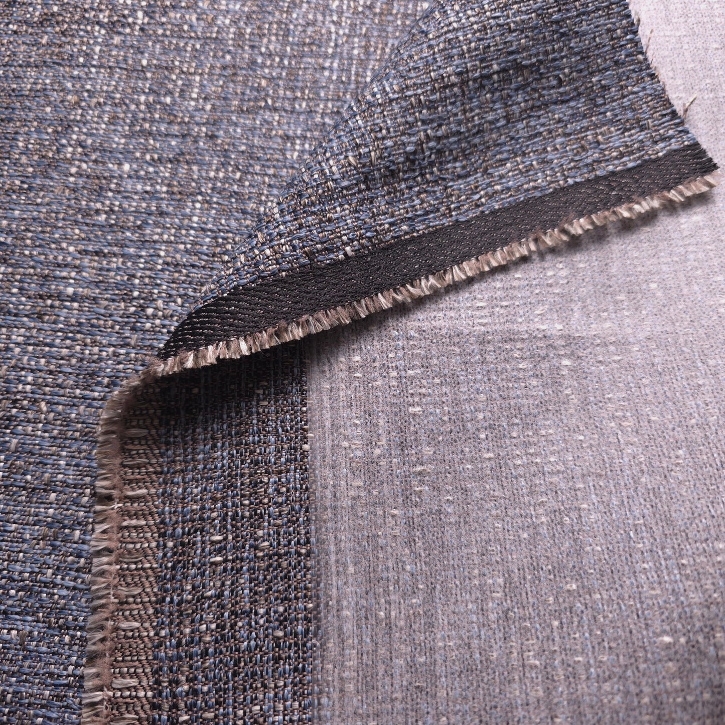 CHARCOAL BLUE BOUCLE UPHOLSTERY